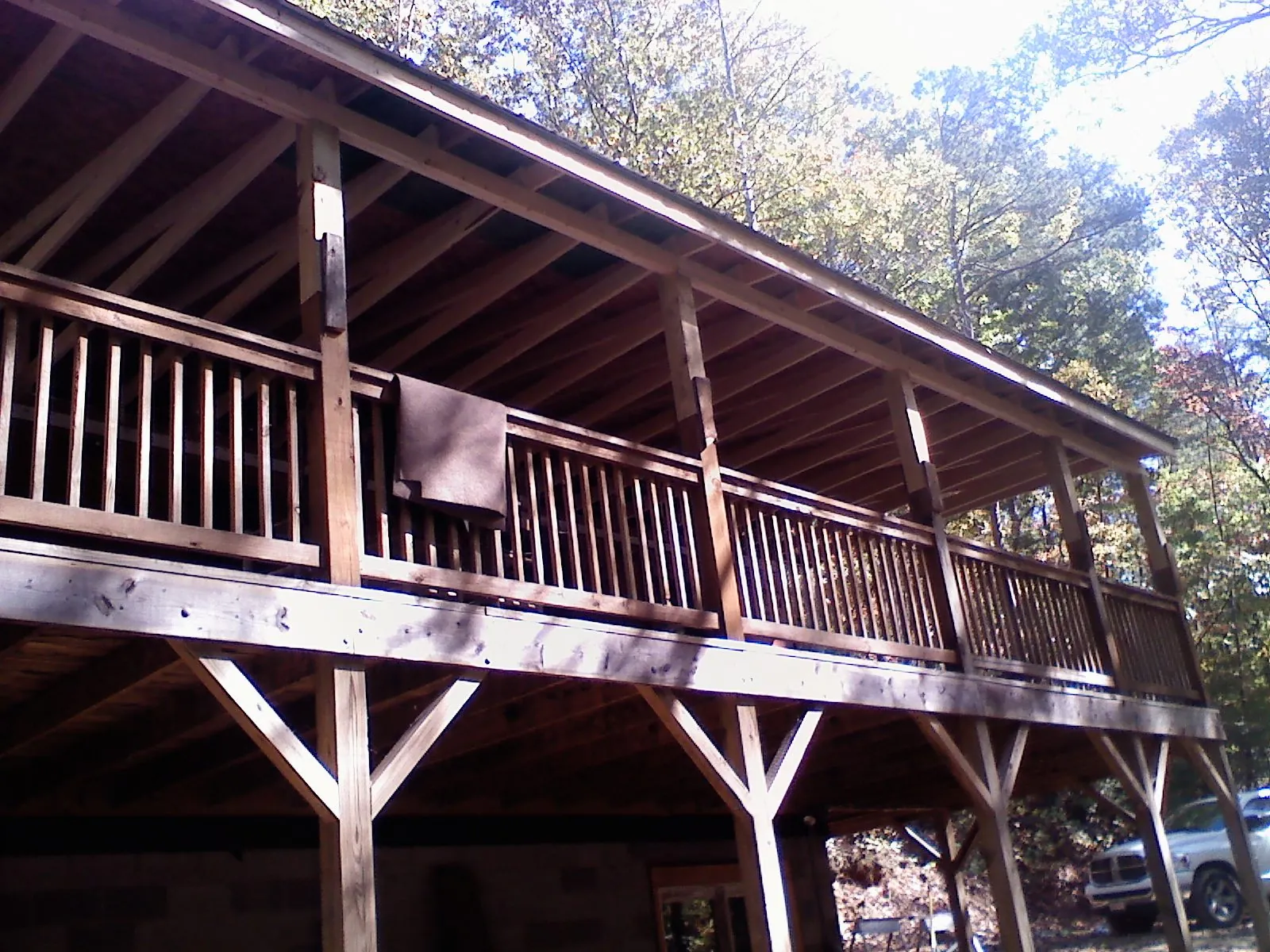 Timber framing under a new elevated porch and deck — Roof Leak Repair in Paxton by Roofing Brothers